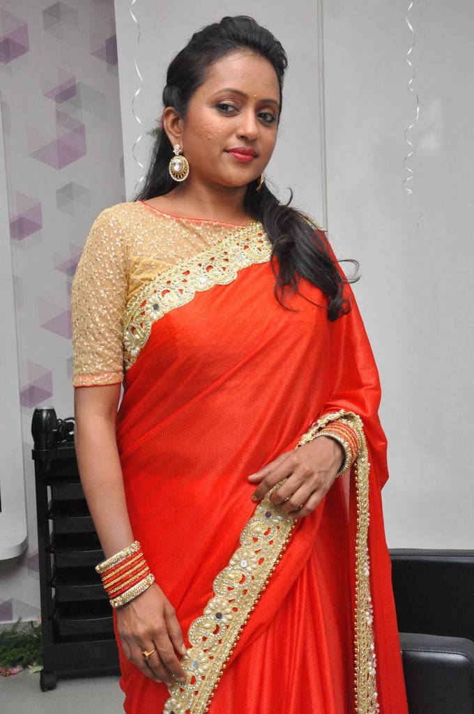 Telugu TV Anchor Suma Stills In Orange Color Saree