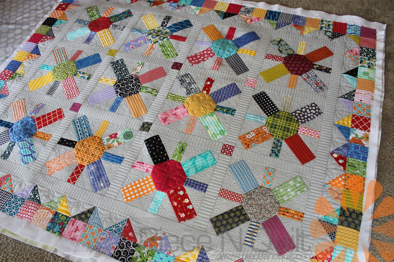 Piece N Quilt Scrappy Quilt Custom Machine Quilting by Natalia Bonner
