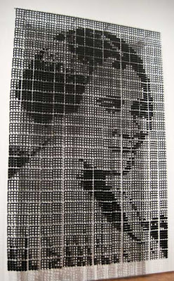 Black and white pixel portrait of a woman, very large