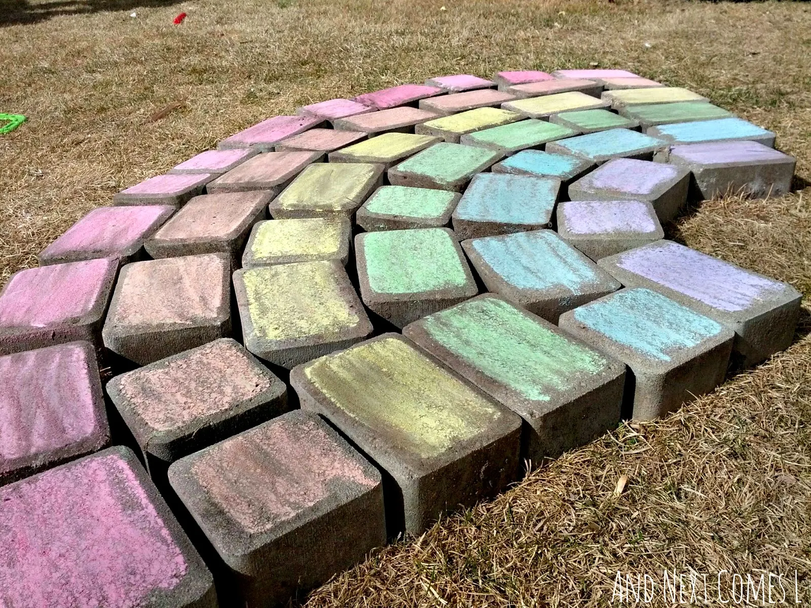 Close up of giant chalk rainbow from And Next Comes L