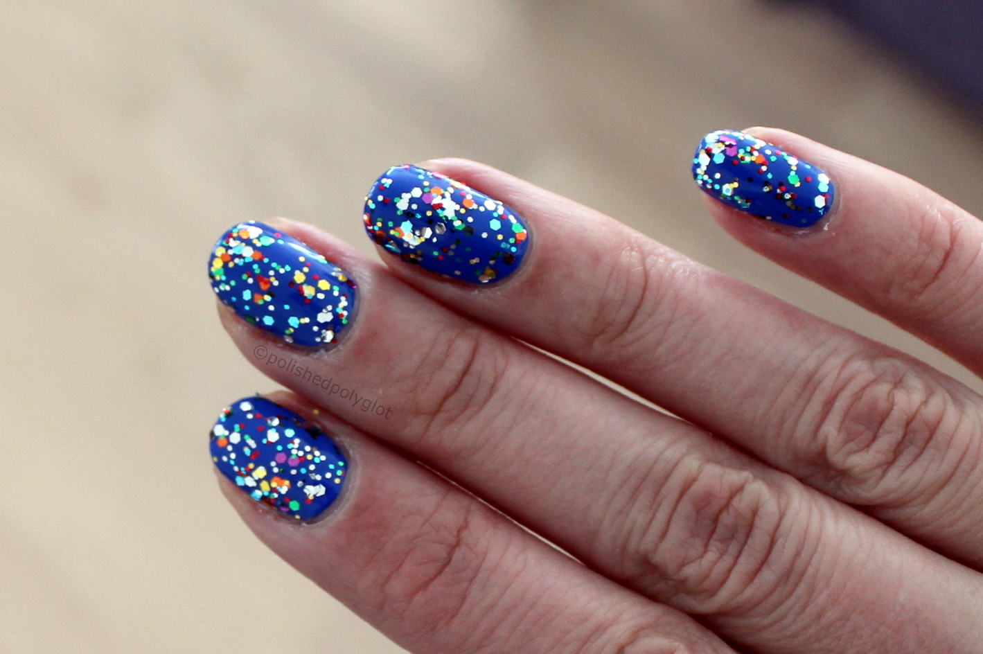 Nail look for Carnival NYX Carnival over Essie Buttler please