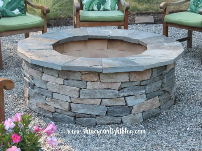 adding pea gravel circle with stone firepit