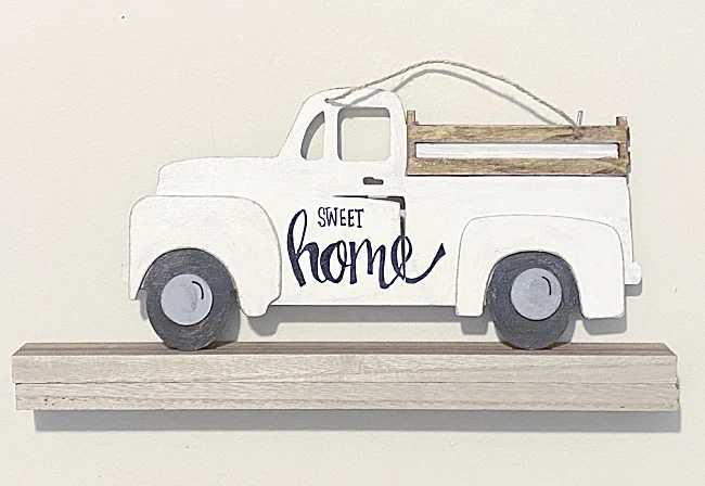 farmhouse truck on a shelf