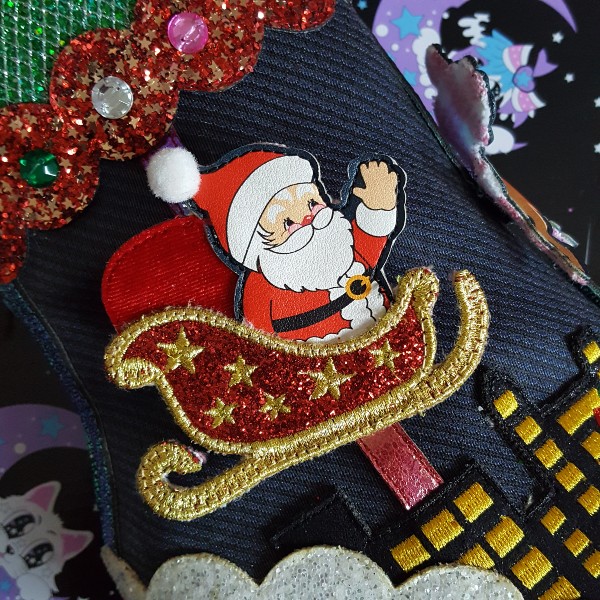 detail of Santa sleigh on side of festive ankle boot
