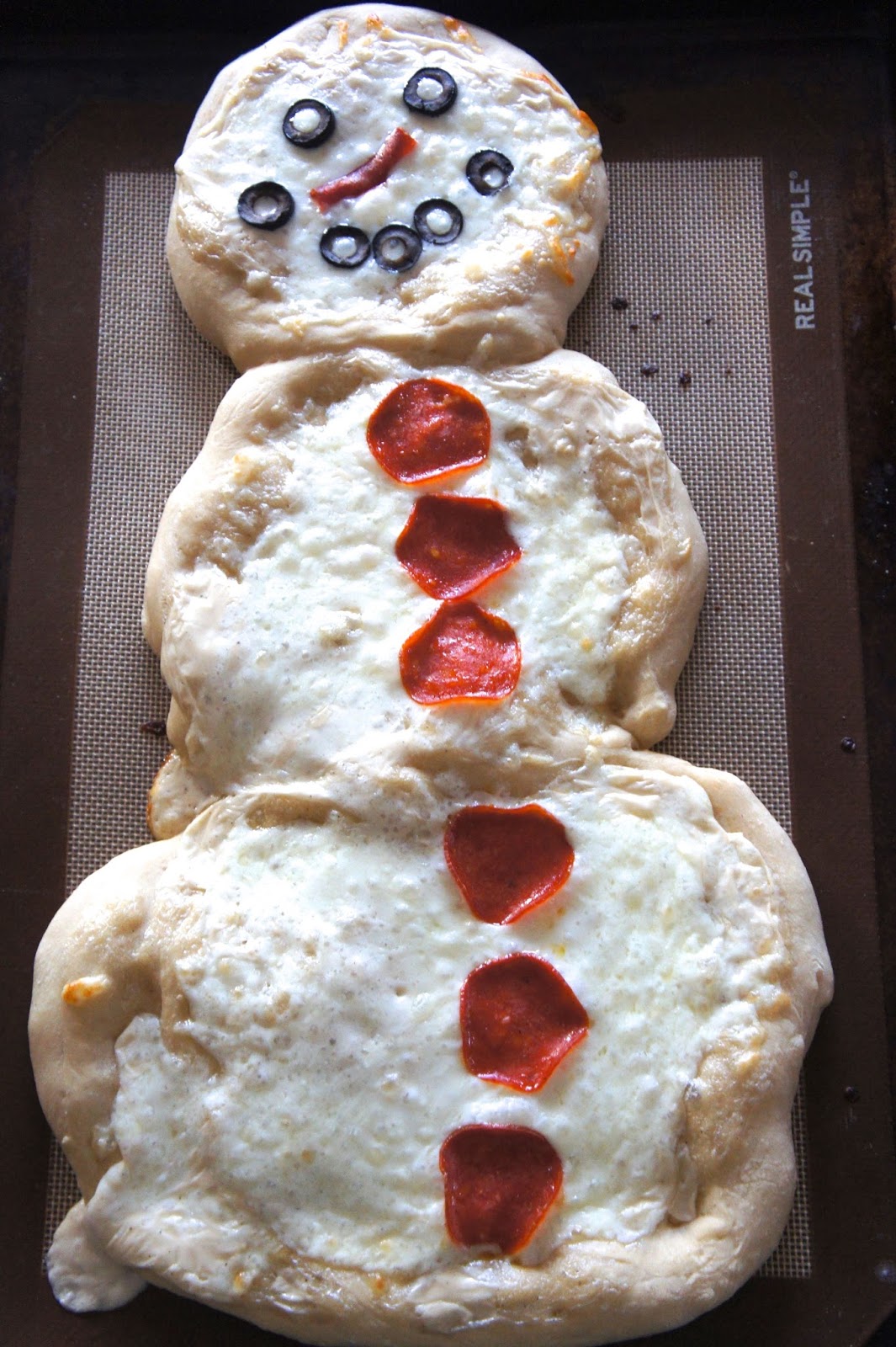Savory Sweet and Satisfying Snowman Pizza