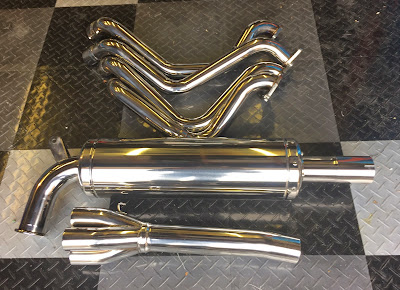 Caterham R500 full exhaust final polish with cotton mop and white compound