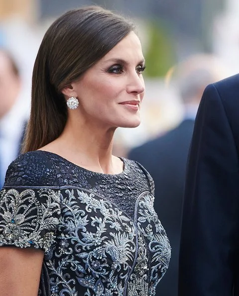 King Felipe and Queen Sofia at Princess of Asturias Awards 2018 ceremony. Queen Letizia wore Felipe Varela dress and Magrit pumps