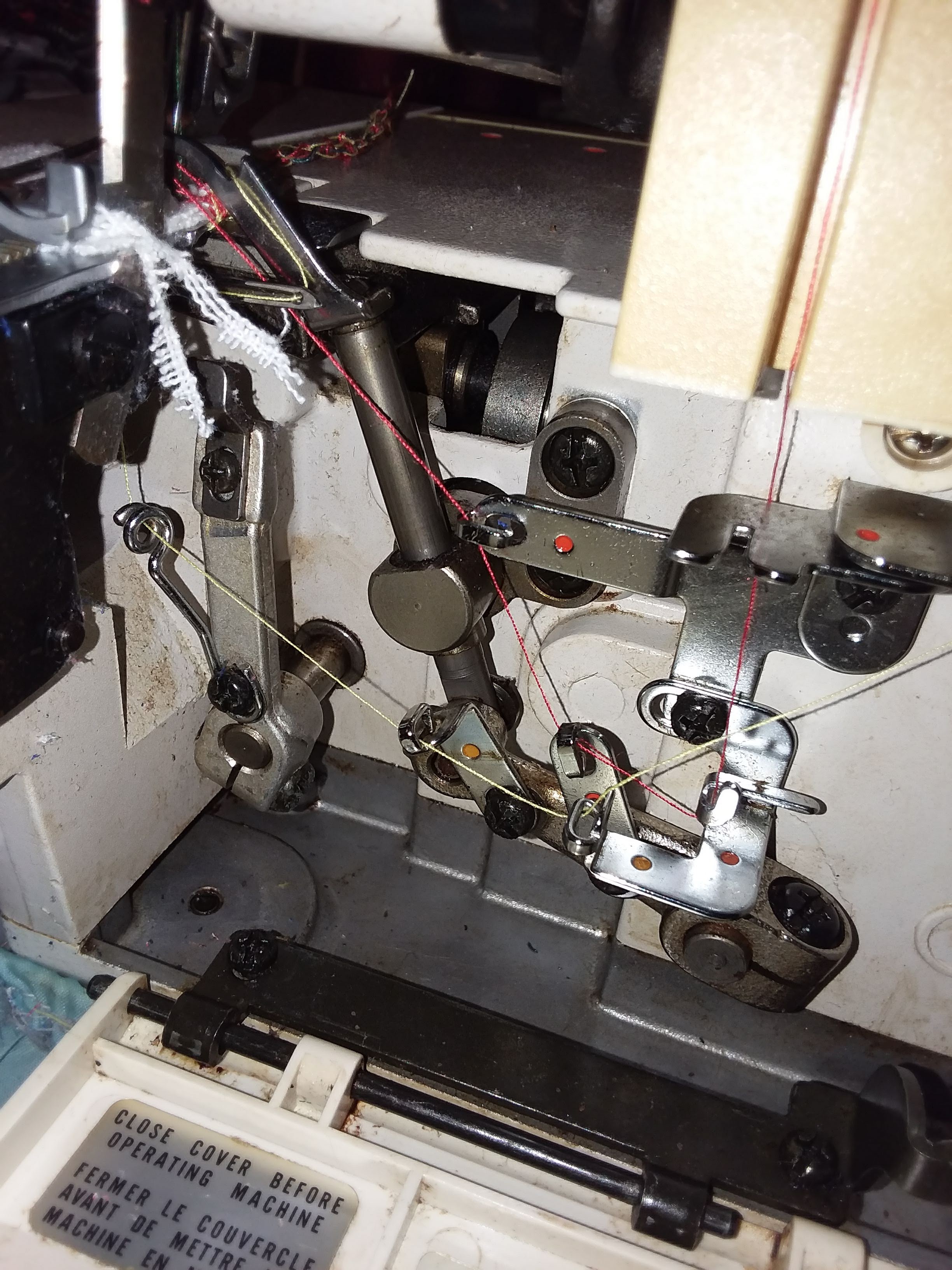 Serger won't catch upper looper thread in left needle