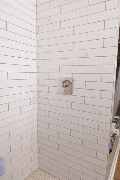 inished tile and grout in master bath shower