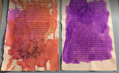 Pages of an old book painted with watercolors
