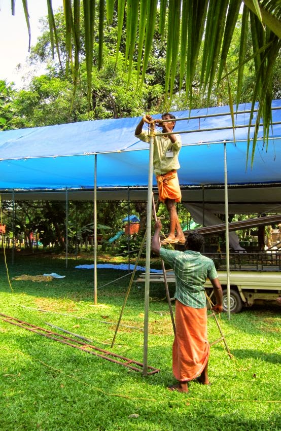 Workers putting up a canopy