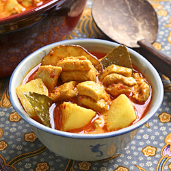 malaysian chicken curry with herbs and spices