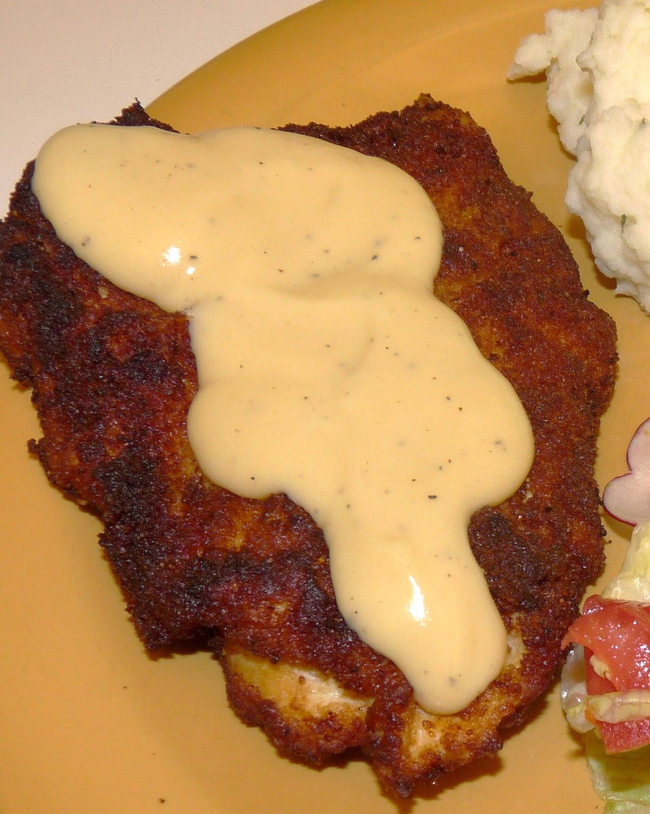 The Rice Tray Chicken Schnitzel with Cheddar Cheese Sauce