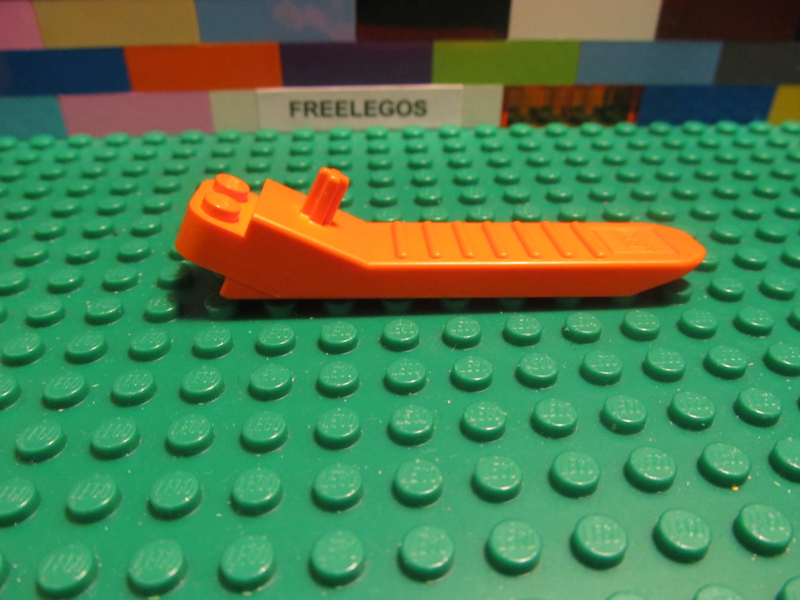 orange lego remover