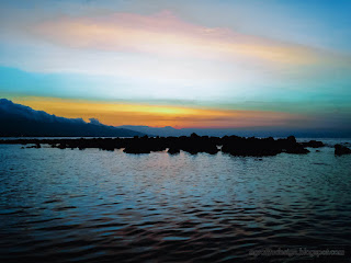 Natural Scenery Dusk Sky On Tropical Rocky Fishing Beach With Calm Sea Water Waves Umeanyar North Bali Indonesia