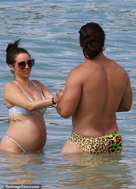 Pregnant Scheana Shay shows off her baby bump in a bikini. 