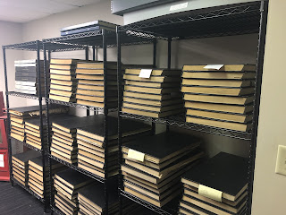 shelves of historic newspapers
