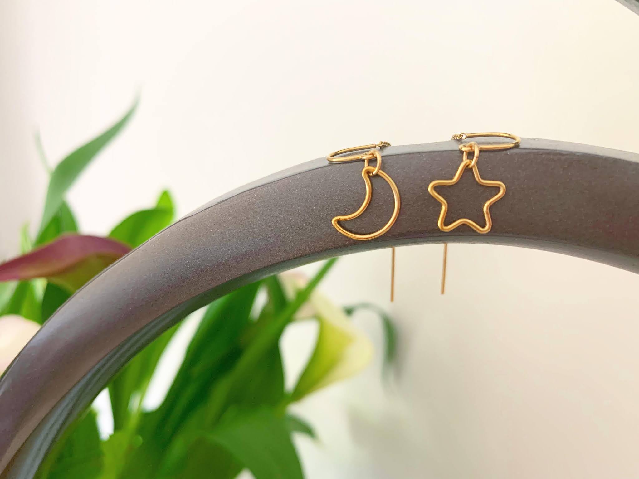 Binichohan Moon and Star Threader Earrings Binichohan Moon and Star Threader Earrings on a rail