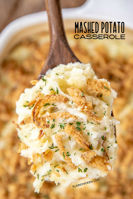 Mashed Potato Casserole - great make ahead side dish for the holidays! SO easy and tastes AMAZING!!! Instant mashed potatoes, hash browns, cream cheese, butter, Monterey Jack cheese, sour cream, garlic, salt, pepper, and french fried onions. Can make in advance and refrigerate or freeze for later. Great for a crowd! #thanksgiving #casserole #makeahead #freezermeal #christmas spoonful of mashed potatoes