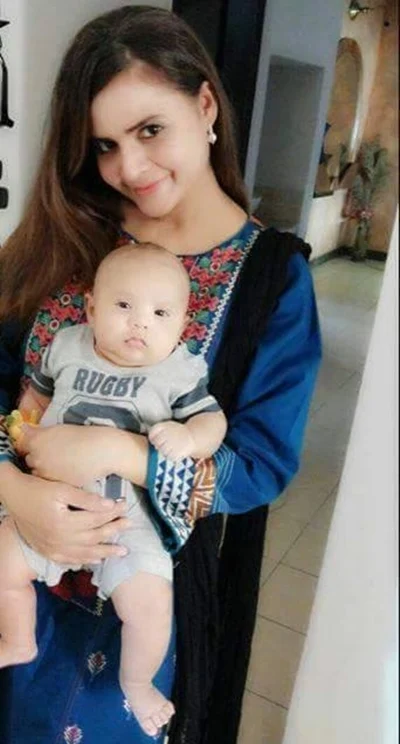 Beenish Chohan with her son