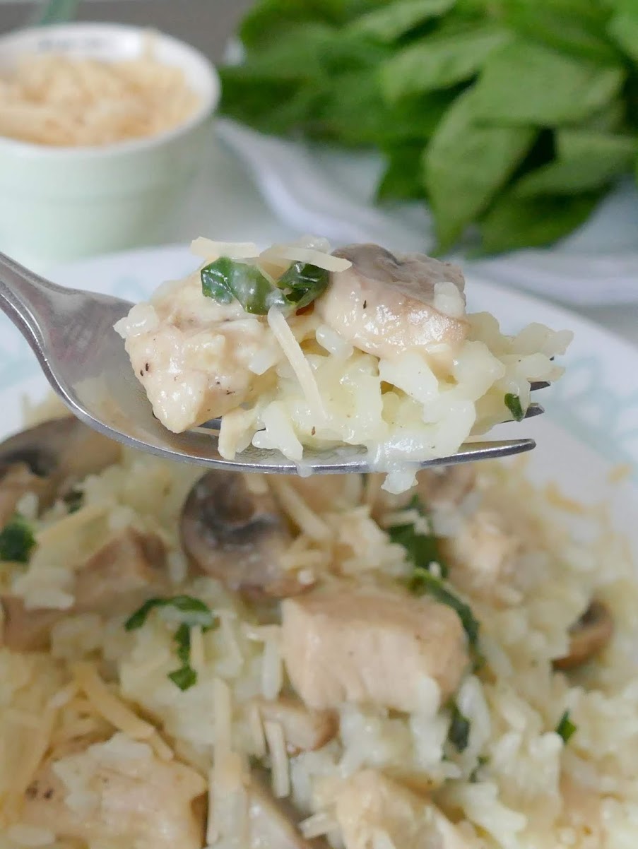 This easy and delicious weeknight dinner idea is ready in less than 30 minutes! It combines chicken breast, jasmine rice, shredded parmesan cheese, white mushrooms and basil for a tasty one pan meal!