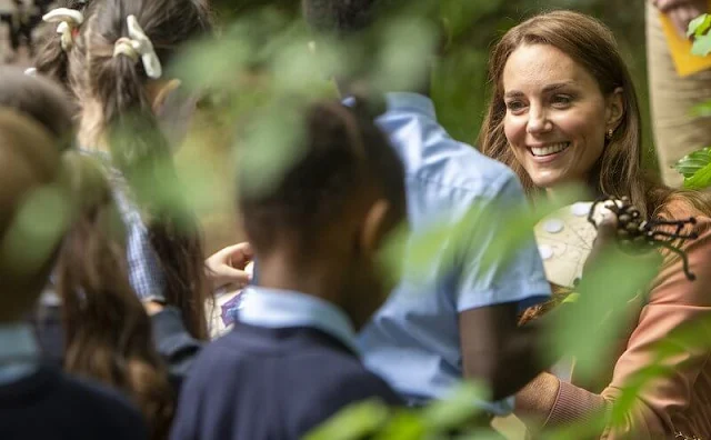 Kate Middleton wore a new safari poudre wool jacket from Chloe, and nadalia top from Ralph Lauren, and blue jeans from Other Stories