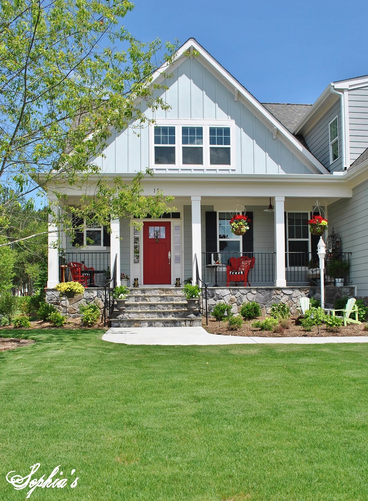 Sophia's: Farmhouse Style Front Porch with Pops of Red