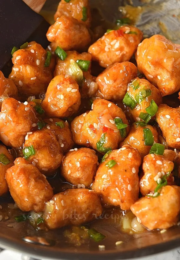 delicious thai sweet chili chicken with chopped  spring onion