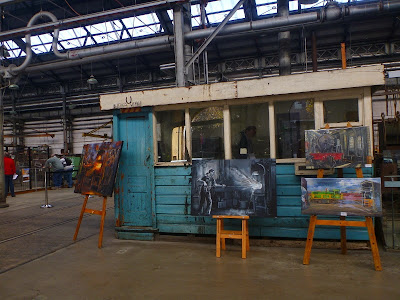 Exhibition of oil paintings of blacksmith's workshop, Eveleigh Railway Workshops painted during ATP Open Day by industrial heritage artist Jane Bennett