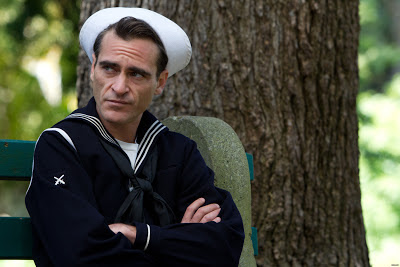 Joaquin Phoenix as Freddie Quell in The Master, wearing the Navy Uniform, directed by Paul Thomas Anderson