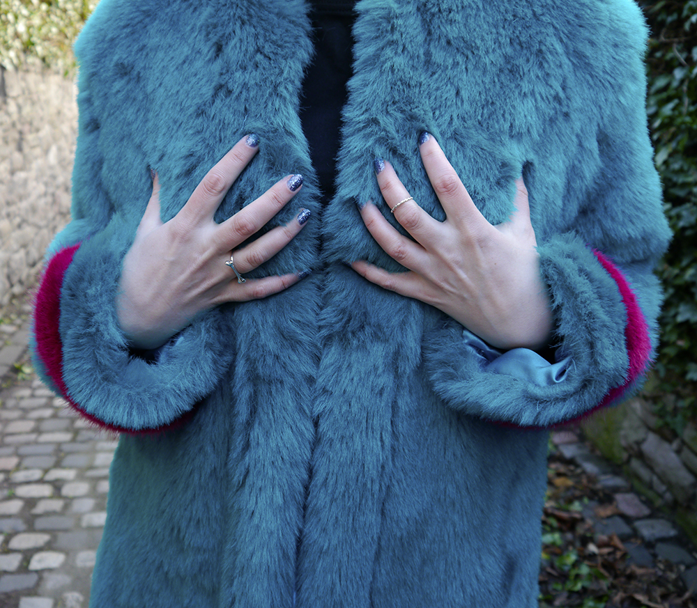 details of turquoise faux fur jacket texture details of turquoise faux fur jacket texture