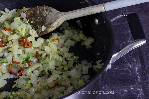 Frying onions garlic ginger and chillies
