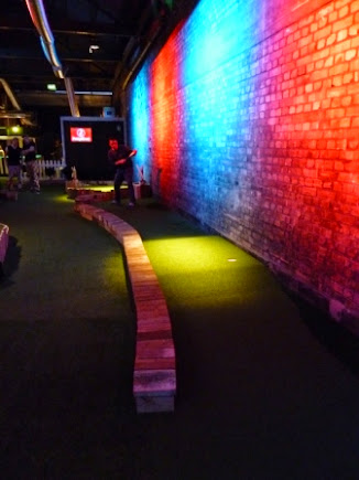 Playing hole 2 at Swingers Crazy Golf in Shoreditch - a couple of ways to play the hole, but watch out for over-hit shots Swingers Crazy Golf in Shoreditch, London