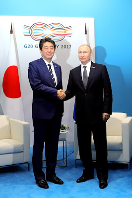 Vladimir Putin with Japanese Prime Minister Shinzo Abe. Vladimir Putin with Japanese Prime Minister Shinzo Abe.