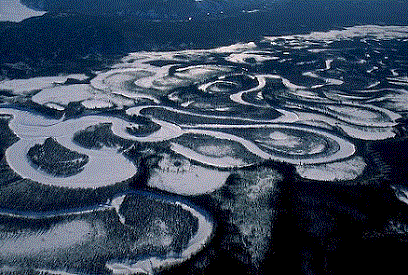 Meandering river covered with ice and snow Meandering river covered with ice and snow