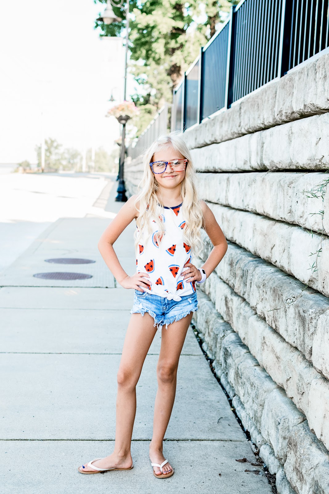 Cute casual looks for the 4th of July for both mom and daughter! Outside BBQ Mom Life Mini Me Mommy and Me Twinning Matching 4th of July Independence Day Shorts Skirt Denim Cut off Skirt Red White Blue Americana American Flag Photography Lifestyle