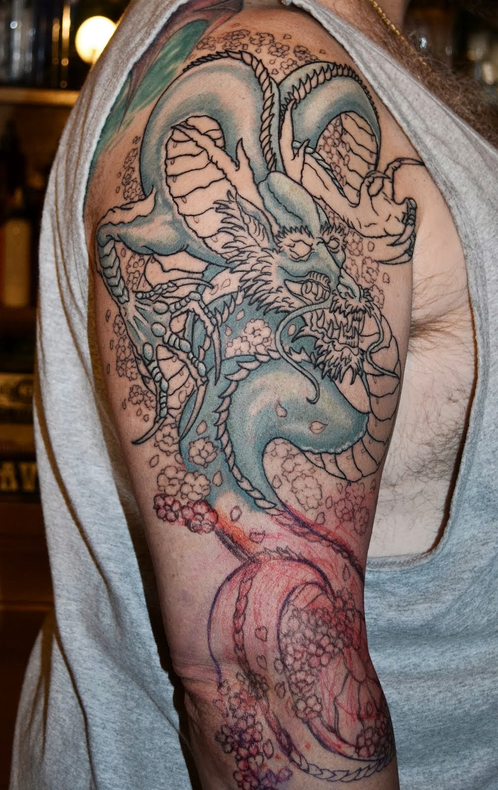 tattoo gallery for men: Dragon Half Sleeve Tattoos For Men