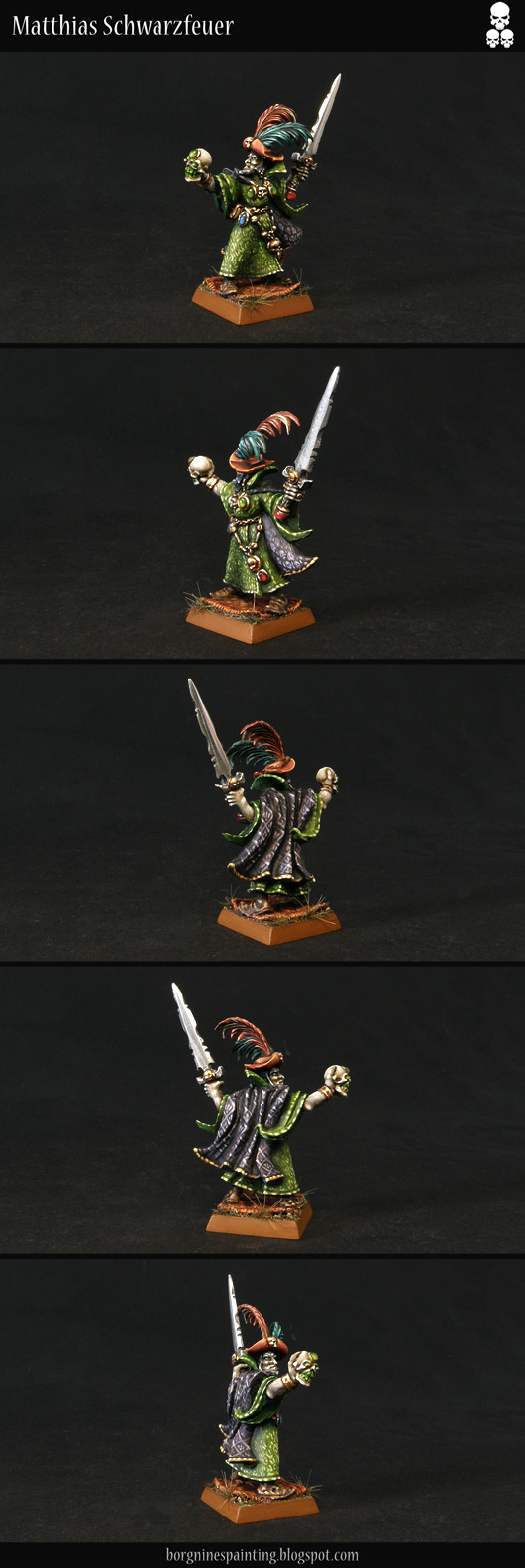 Old metal Necromancer miniature from Games Workshop, seen from several angles, converted and painted to be really extravagant and flamboyant, with a feathered hat and intricate, freehanded designs on his robes and cloak. He is usable in Warhammer Fantasy Battle (WFB) or Age of Sigmar (AoS).