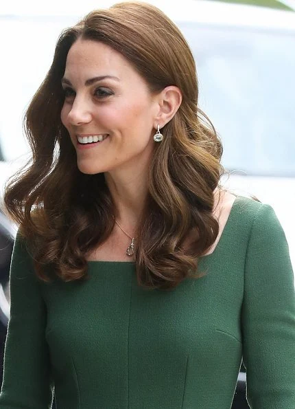 Kate Middleton in a custom forest green Emilia Wickstead dress, Mulberry bag and Gianvito Rossi heels