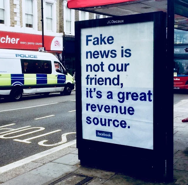 Fake news is not our friend, it's a great source of revenue. Highlighting a poster in UK by some protesters, who trying to shame Facebook by vandalising its ubiquitous 'not our friend' ads in London
