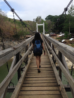 Crossing the hanging bridge of Mt. Manalmon