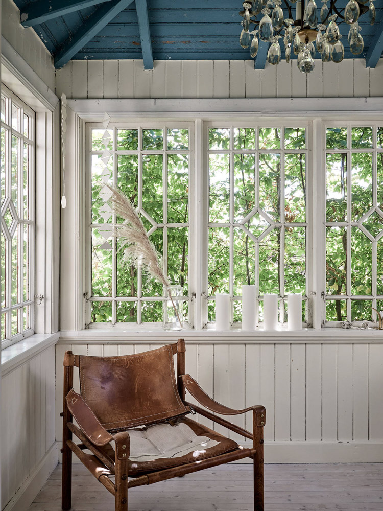 An Idyllic Blue and White Swedish Cottage In The Countryside