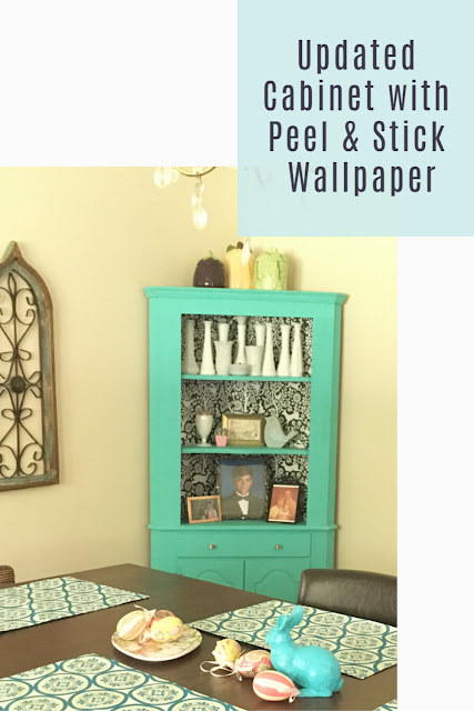 Update your cabinets with peel and stick wallpaper!