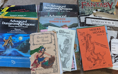 An assortment of old-school RPG books and zines