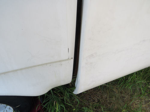 sprung fiberglass trailer door
