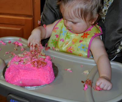 Birthday girl attacks pig cake