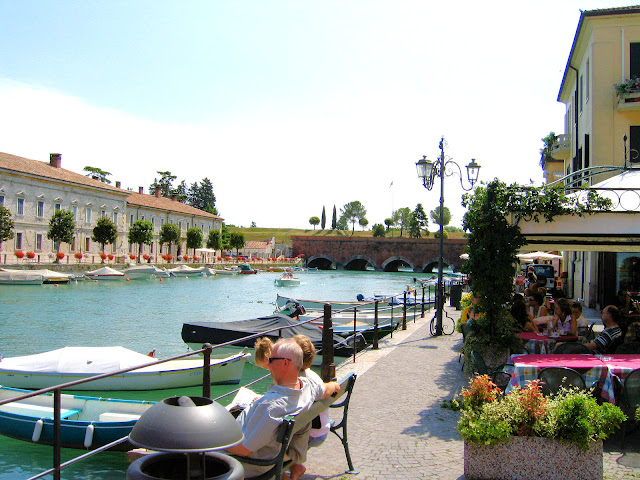 Pescheira del Garda at the southernmost point of Lake Garda is reminiscent of Venice with its quaint narrow streets and centuries-old canals.