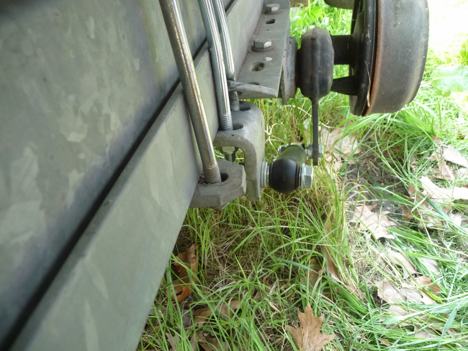 We sail Phobos 21 Adding shocks onto our trailer