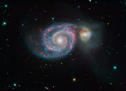 The red/pink areas of the galaxy are star forming HII regions.