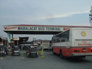 Open air bus entering the Mabalacat bus terminal. Dau bus terminal.